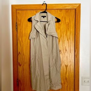 Tan long vest. Super cute with leggings or jeans and a long sleeve or tshirt.